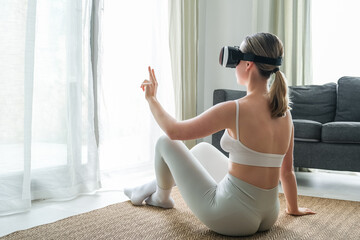 VR sport,Workout home vr,Fitness vr home,VR fit.Girl doing fitness in VR glasses home ,virtual reality exercise, immersive workout,VR sports,virtual gym,immersive spaces,futuristic environment