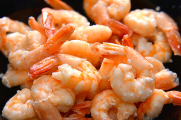Cooked delicious shrimp, food background close-up.