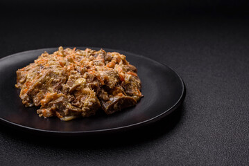 Delicious boiled beef or pork tongue sliced with carrots, onions, sour cream and spices