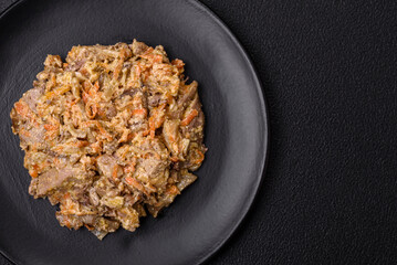 Delicious boiled beef or pork tongue sliced with carrots, onions, sour cream and spices