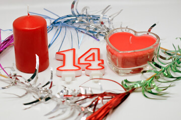 Valentine's Day is February 14th. Red hearts in all types.
Red and pink candles.
Background...