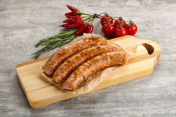 Raw sausages with spices and herbs