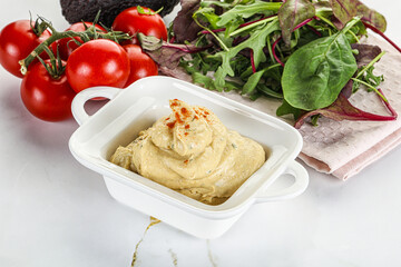 Creamy hummus in the bowl