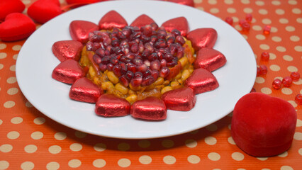 Valentine's Day is February 14th. Red hearts in all types.
Salad Pomegranate heart. Engagement.