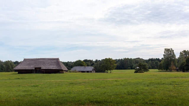 Landscape of an ancient village in the fields of Lithuania during the summer