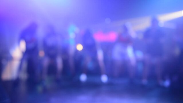 background of intentionally blurred girls dancing twerking, reggaeton, funky and perreo. Horizontal video. Urban dance concept.