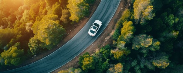 Aerial top view of luxury car on the road in the mountain, forest, hills, banner with copy space,...
