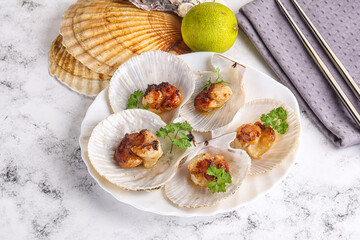 Grilled scallops shell with butter