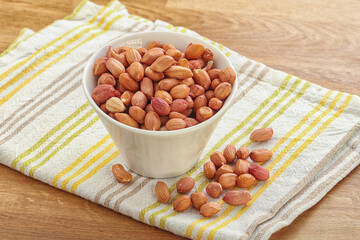 Raw peanut heap in the bowl