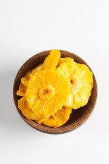Dried pineapple in a bowl. Dried fruits. 