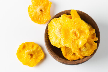 Dried pineapple in a bowl. Dried fruits. 