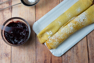 Pancake and plum jam