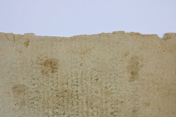 Corners of old tattered paper on a white background