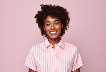 Fototapeta premium African young beautiful woman posing and smiling. pink background.