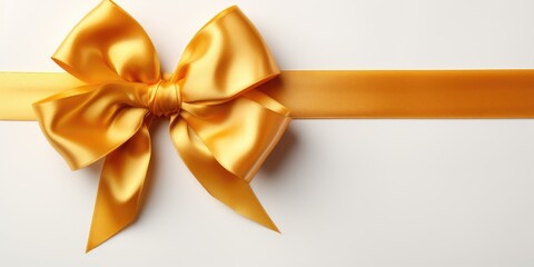 Golden silk bow with ribbon on a white background. Top view, postcard shot. Generative AI