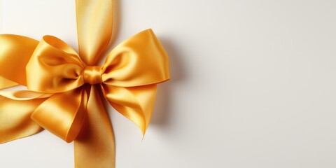 Golden silk bow with ribbon on white background. Generative AI