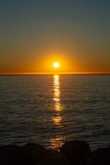 Fototapeta na wymiar Sunrise over Mediterranean sea in Benalmadena, Malaga, Costa del sol, Spain