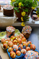 Close-up view of chicken eggs, homemade easter cake and willow twigs