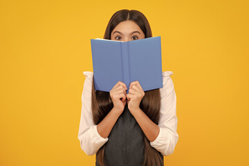 Schoolgirl with copy book posing on isolated background. Literature lesson, grammar school....