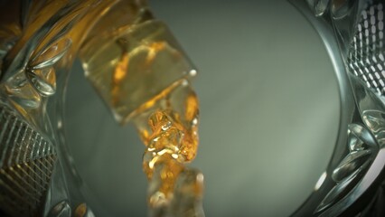 Pouring Whiskey into Glass, Macro Shot.