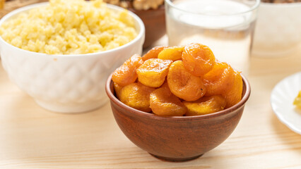 Dried apricots in a clay cup, the concept of healthy and healthy food