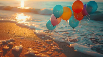 Fototapeten Sunset beach party with balloons floating above the sand casting colorful shadows © earthstudiotomo
