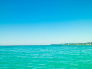 Blue water of Tyrrhenian sea in Vada, Tuscany, Italy.