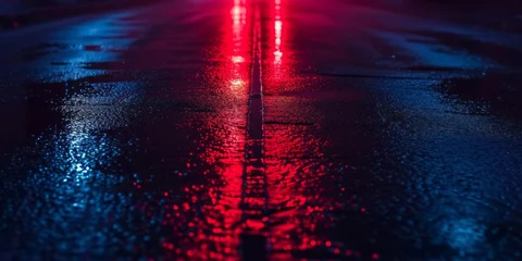 Foto op Aluminium A wet road at night reflecting the intense red glow of a traffic light. © Sandris