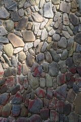 old wall made of real stone in the sun 3