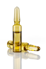 Pharmaceutical ampoules with medication on white table against. Close-up