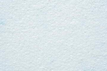 Simple white flat piece of styrofoam material structure background texture, seen from above, top view closeup detail shot, nobody Plain blank insulation styrofoam part backdrop, copy space, no people