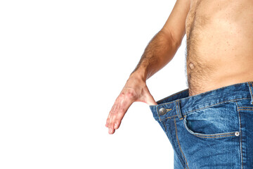abdomen of man in profile with pants that are too big for having lost weight on white background