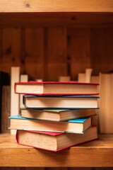 pile of books closeup celebrating world book day vertical portrait