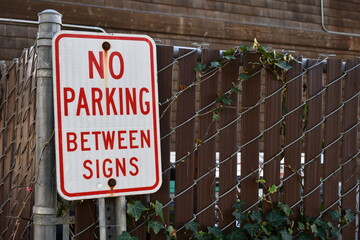 No Parking Between Signs sign.