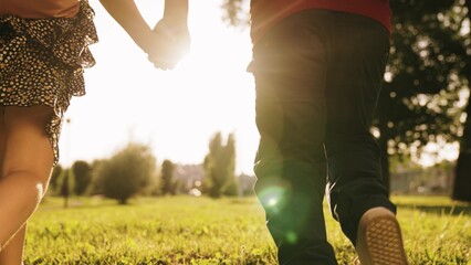 happy children with school backpacks running hands along green lawn sunset, children dream, school...