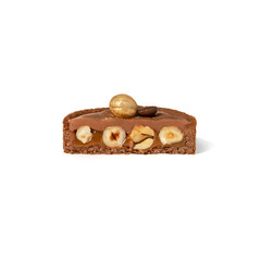 Half chocolate tartlet with hazelnuts on white background. Candy bar, sweets and dessert, cake cut in half