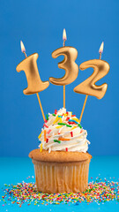 Candle number 132 - Cupcake birthday in blue background