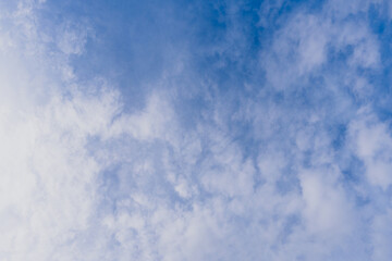 Obraz premium beautiful summer sky with soft clouds of vivid, clean summer blue. Natural cloud background