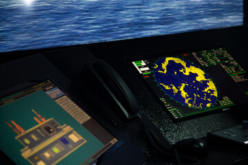 Display of radar, radio, AIS and ECDIS screens in the ship simulator navigation room - obrazy, fototapety, plakaty