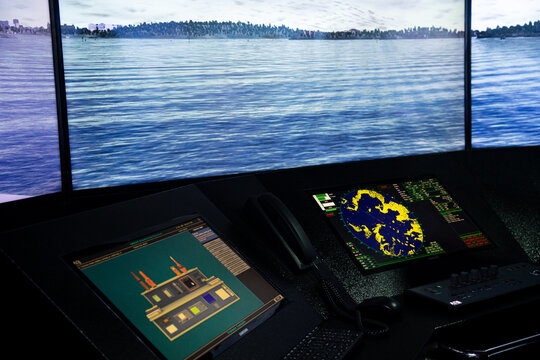 Display of radar, radio, AIS and ECDIS screens in the ship simulator navigation room