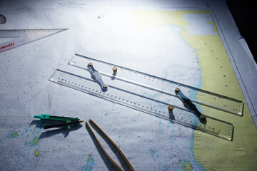 Look for maps before starting a voyage to determine sea navigation routes and navigation equipment such as calipers and rulers
