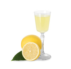 Liqueur glass with tasty limoncello, lemons and green leaf isolated on white