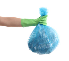 Woman holding plastic bag full of garbage on white background, closeup