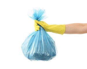 Woman holding plastic bag full of garbage on white background, closeup