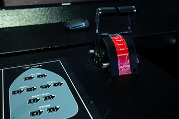 Ship engine throttles and control panel wheelhouse in navigation deck © Janwar