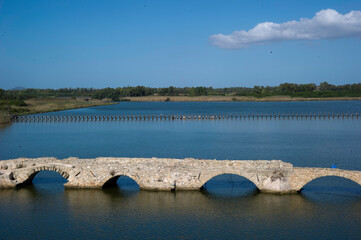 bridge over the river in summer Fertilia, Ponte Romano sul Calich. Alghero, SS, Sardegna, Italy