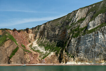 Fototapeta na wymiar View of multi-coloured sand cliffs of Alum Bay, Isle of Wight, UK