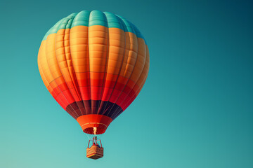 Fototapeta premium A colorful hot air balloon rising against a clear blue sky, creating a whimsical and uplifting scene. Concept of adventure and exploration. Generative Ai.
