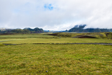 Fototapeta premium Low Clouds Over Beautiful Icelandic Pasture