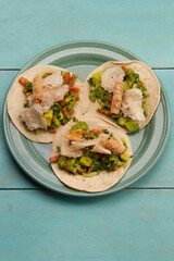Mexican tacos Placeros with chicharron and guacamole.